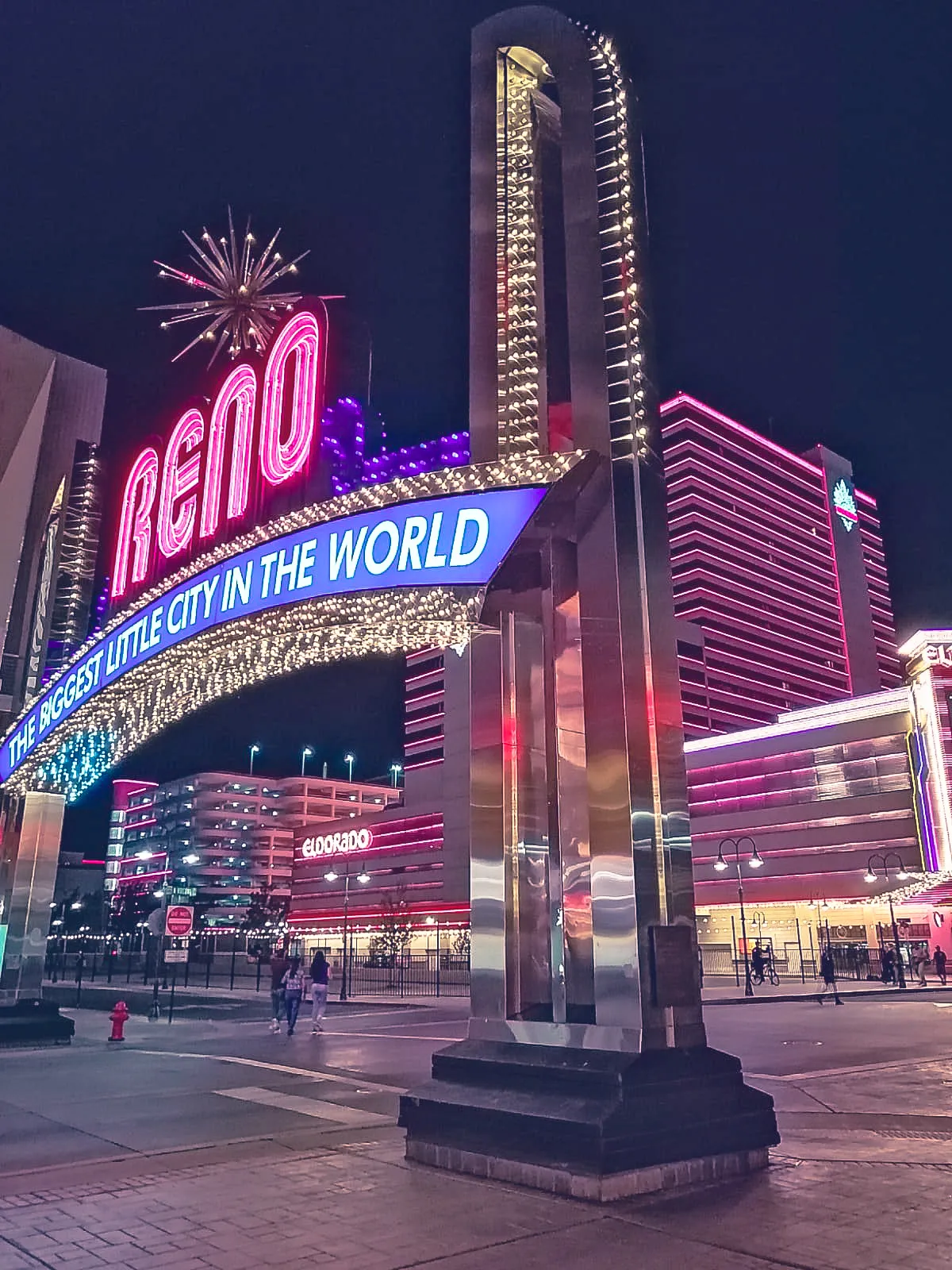 The Reno arch lit up at night
